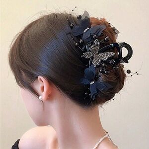 Elegant Black Hair Clip with Floral Design